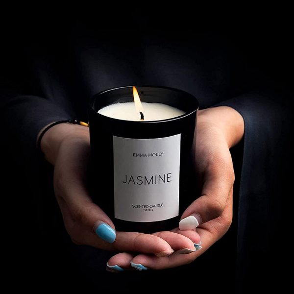 emma molly jasmine scented candle black glass in hands