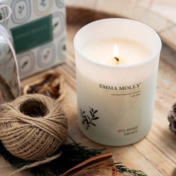 Emma Molly Sulawesi Ebony Scented Candle on the table